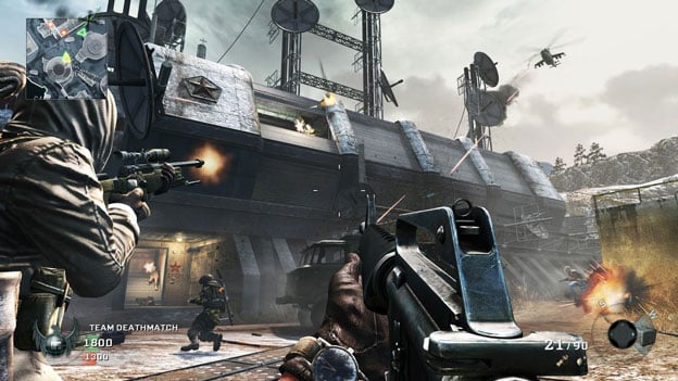 Screenshot from Call of Duty: Black Ops - Annihilation, showing a soldier pointing his gun at an enemy from a first person perspective.