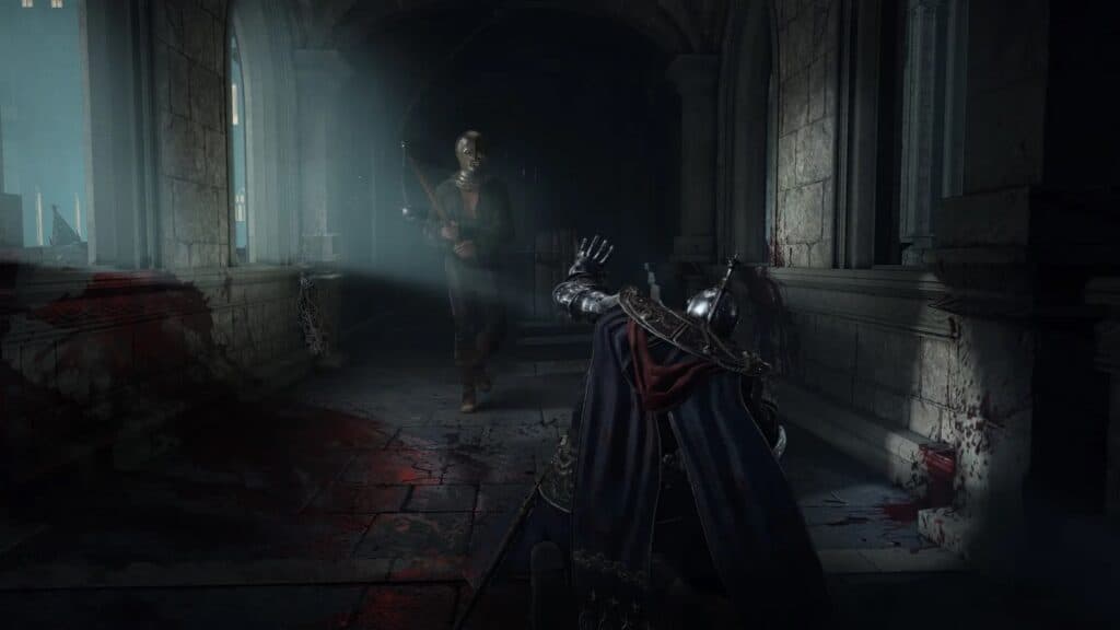 A prisoner in Elden Ring attacking a guard with a flail.