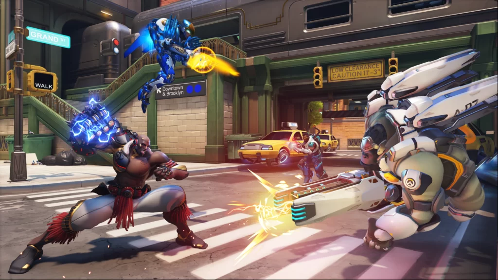 Two character battle on the streets in an Overwatch 2 map.