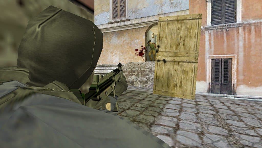 A counter-terrorist is aiming at a terrorist in Counter-Strike.