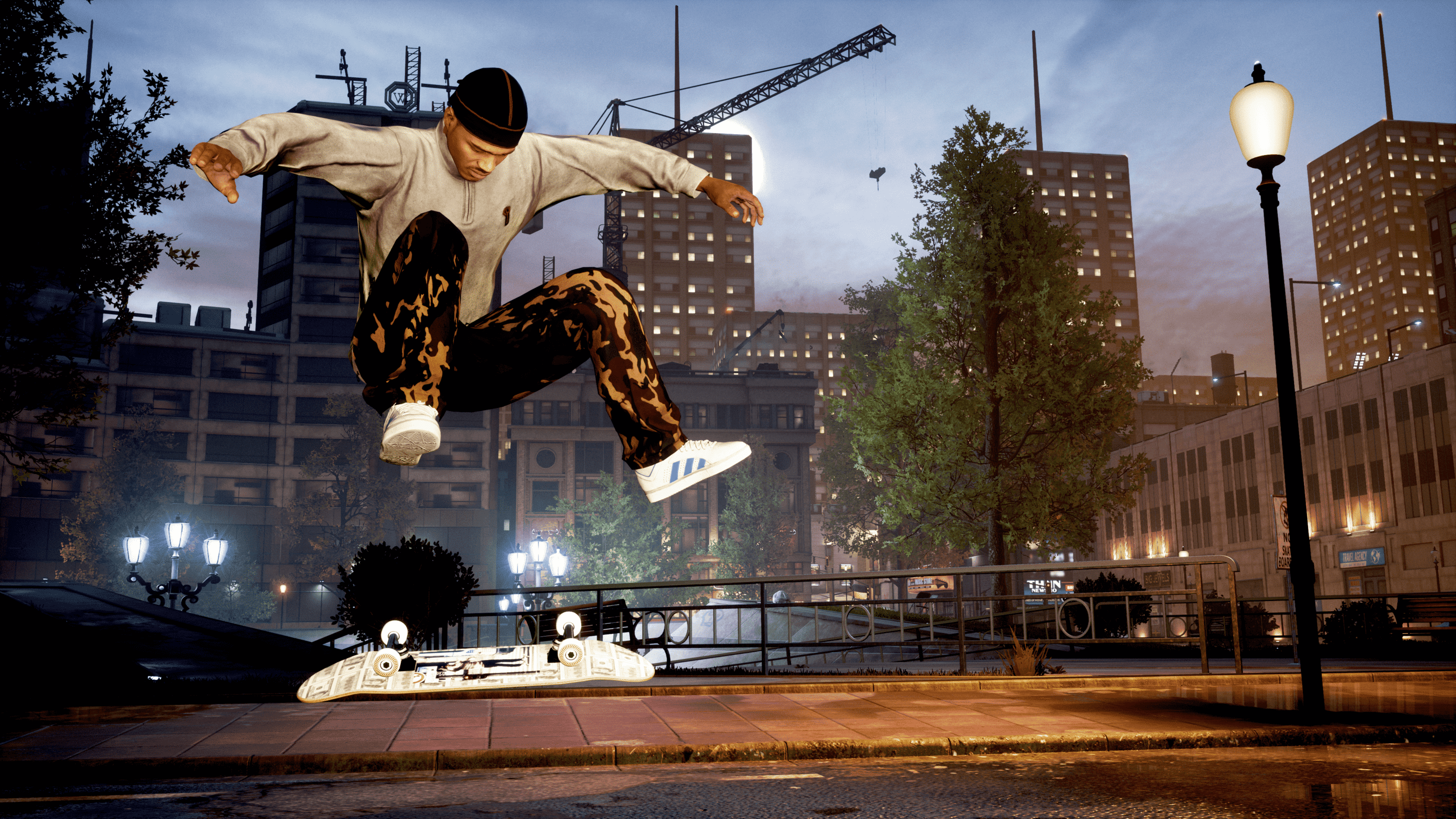 A man kick flipping a skateboard.