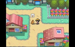 promotional screenshot of Pokemon HeartGold and SoulSilver with player walking around a town.