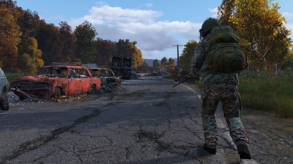 A DayZ survivor navigates the ruined streets of Chernarus, the game's setting.