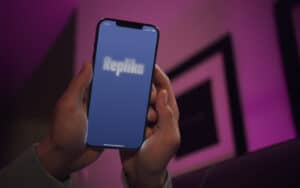 A person using the Replika app on a smartphone.