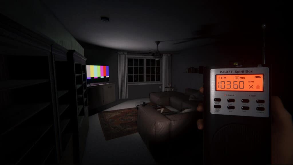 A Phasmophobia player uses a spirit box to track spectral activity in a house.