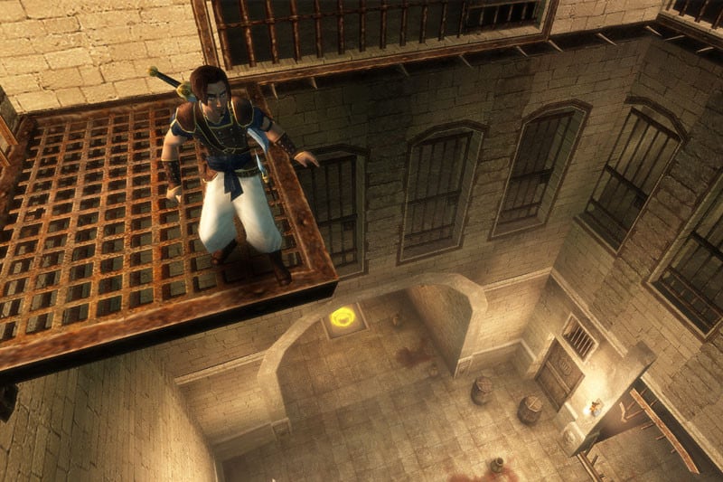 The eponymous prince stands on a ledge in Prince of Persia: The Sands of Time.