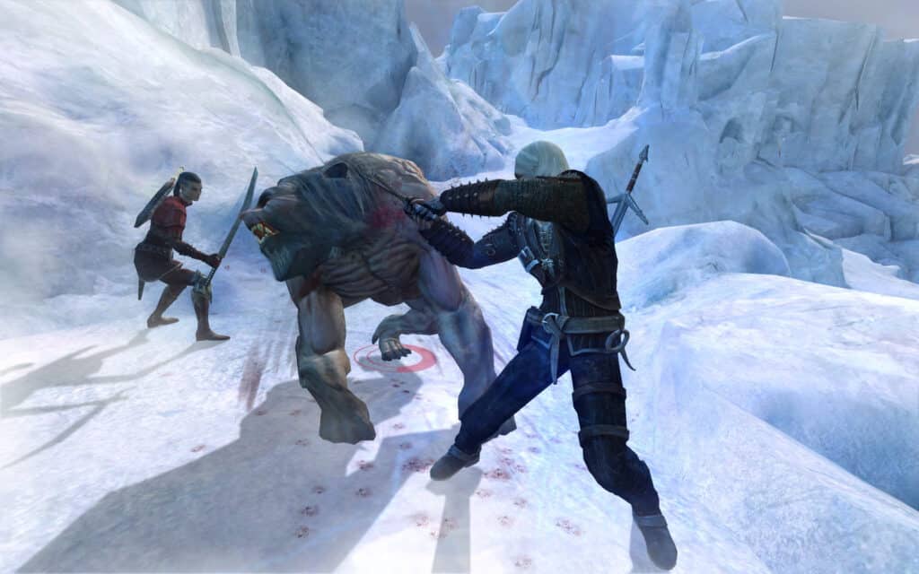 Geralt battles a bear monster in this screenshot from The Witcher.
