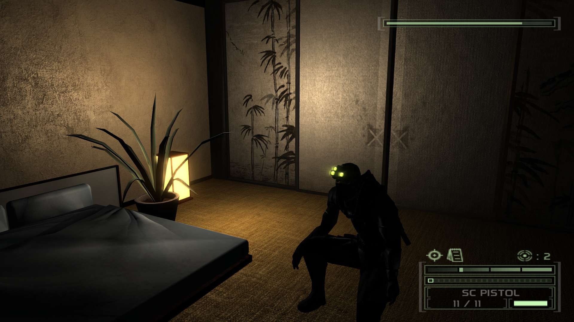 Sam Fisher kneeling in Tom Clancy's Splinter Cell Chaos Theory.