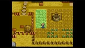 A screenshot of the original Harvest Moon, with the player character lifting a rock over their head as they tend to the farm.