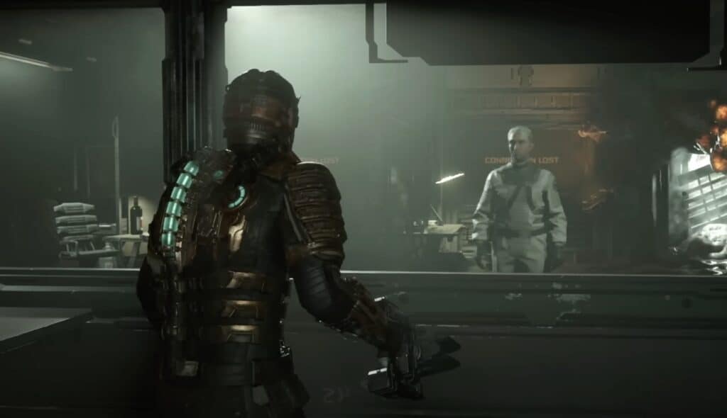 A screenshot of Isaac Clarke talking to a man behind glass