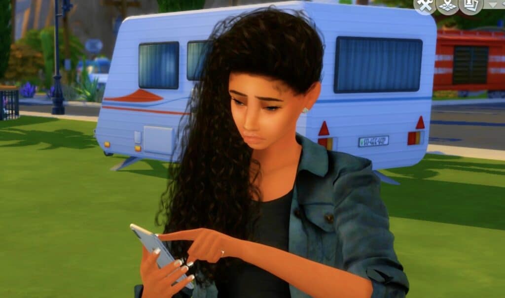 A teen Sim checking her phone