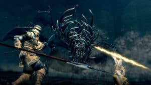Two Dark Souls players battle the Gaping Dragon.