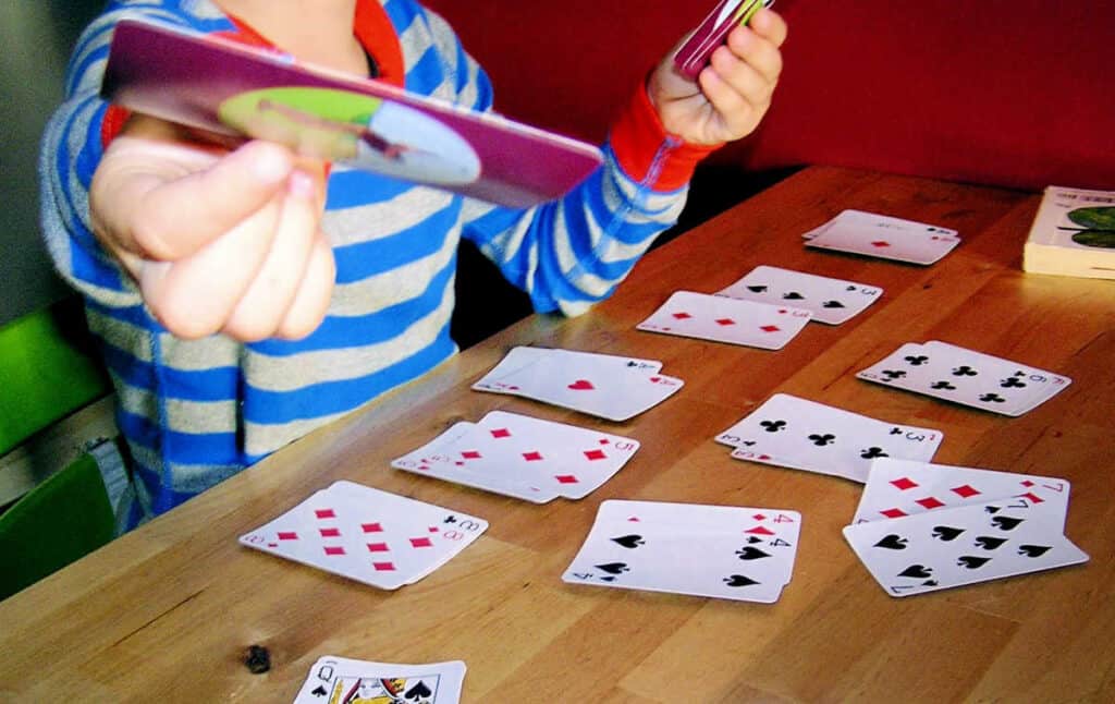 Kid Playing Go Fish