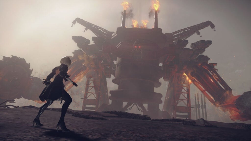 NieR: Automata's protagonist faces off against a giant robot.