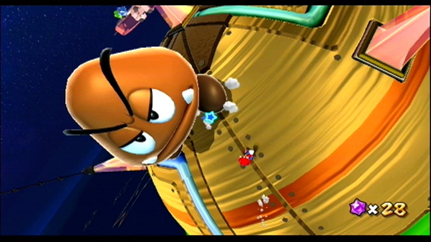Mario faces off against a giant Goomba in Super Mario Galaxy.